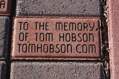 Tom's brick of dedication at the Fur Peace Ranch